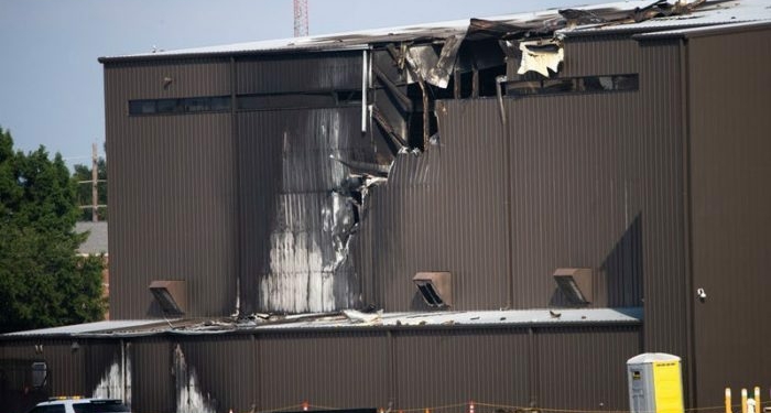 The Texas planes crashed into the Addison airport hangar: no survivor. Photo: Dallas News