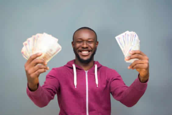Nigerian man holding money