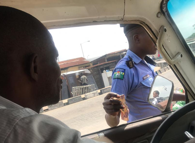 Photos Policeman Caught On Camera Collecting Bribe 