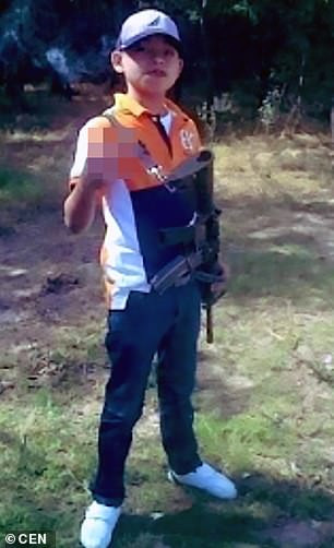 16-year-old Mexican hitman Commander Little has his head blown off in bloody gun battle with police officers?(Photos)
