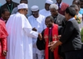 President Buhari and CAN President exchanging pleasantries while others watch (Image for depiction)