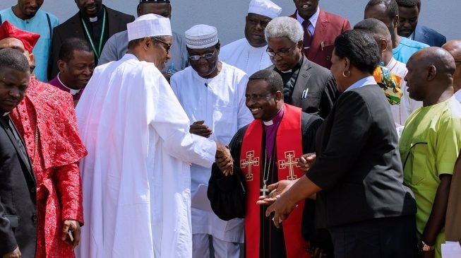 President Buhari and CAN President exchanging pleasantries while others watch (Image for depiction)