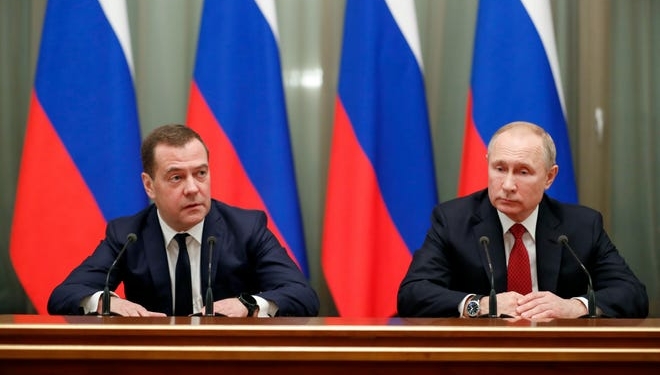 Prime Minister of Russia, Dmitry Medvedev and President Vladimir Putin