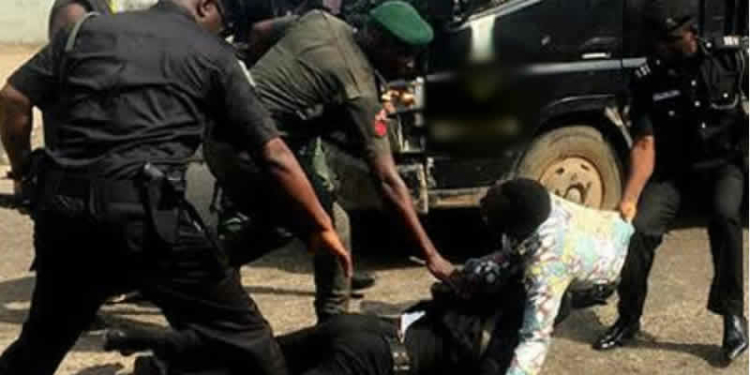 Nigerian Police officers during arrest