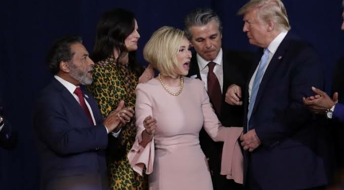 Pastor Paula White discussing with President Donald Trump
