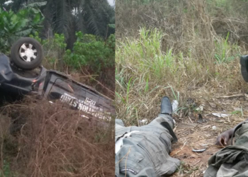 Scene of accident, remains of two officers killed after the auto crash.