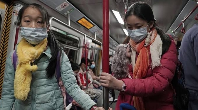 Depict of foreign nationals inside train