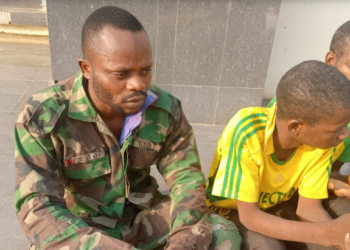 L-R arrested fake soldier and two out of the 11 arrested suspects