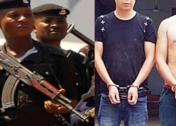 Nigerian policemen, depict of arrested Chinese men