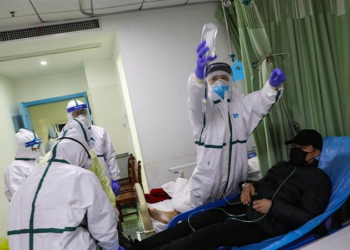 File photo of doctors attending to a Coronavirus patient