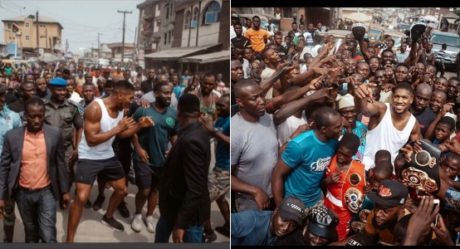 Anthony Joshua takes his belts to the streets of Makoko in Lagos
