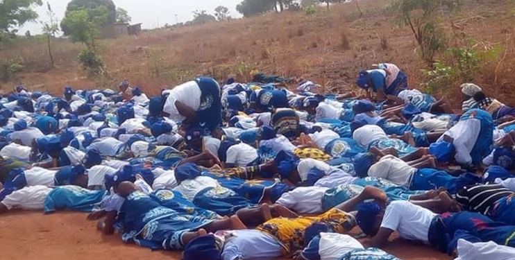 Group of church women spotted lying on the road in Benue, praying against Coronavirus