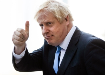 Update: Coronavirus stricken Boris Johnson 'improving' and 'sitting up in bed'