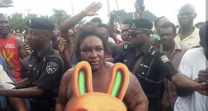 Female robber and accomplices stripped and disgraced after robbing along Benin-Auchi road