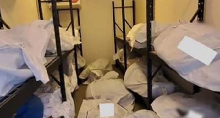 COVID-19: Photos show bodies piled up and stored in vacant rooms at Detroit hospital