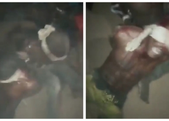 VIDEO: Suspected robbers beg for mercy as they're tortured after they were allegedly caught robbing in Ikotun