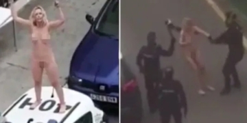 Woman strips naked and jumps on police car after leaving court for breaching lockdown order