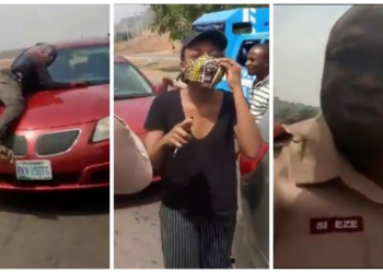 VIDEO: Policeman spotted on bonnet of speeding vehicle of a lady who refused to stop for security operatives