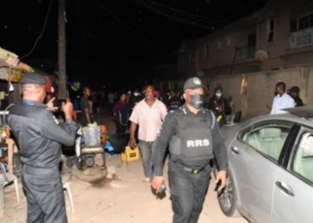 PHOTO: Bar owner and his customers arrested for violating lockdown order in Lagos