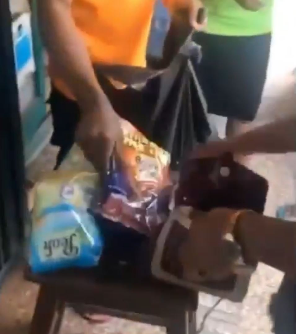 VIDEO: Pretty Lady stripped, embarrassed for stealing milk, other petty items from a Pharmacy in delta State