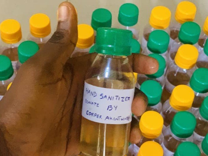 PHOTO: Corps member donates hand sanitisers in Ogun
