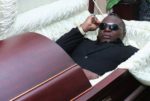 Charly Boy reveals why he is not scared of death as he lays in a coffin in new photos