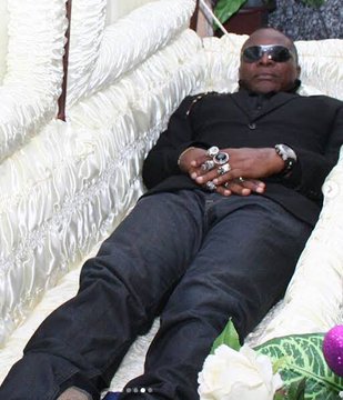 Charly Boy reveals why he is not scared of death as he lays in a coffin in new photos