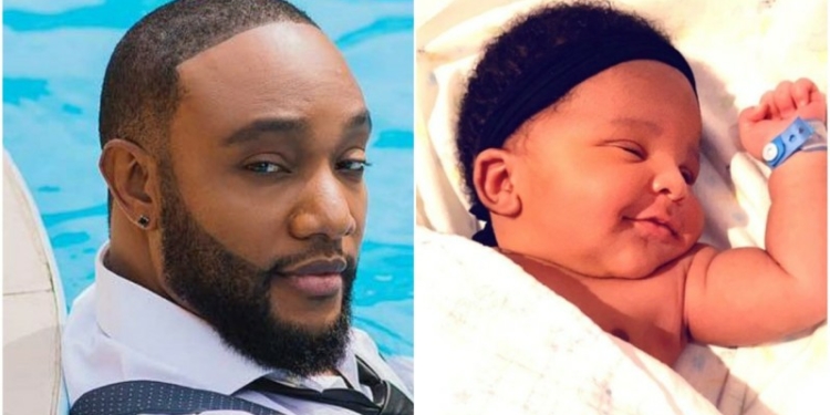Kcee and his new born baby