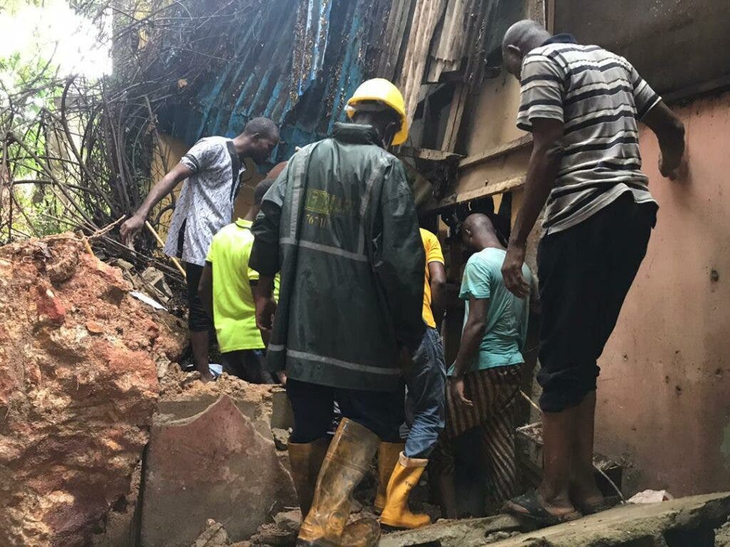PHOTOS: Two die as storey building collapses in Lagos