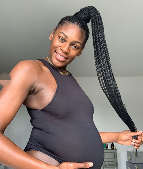 Mike Edwards's wife Perri Shakes-Drayton cradles her baby bump as she prepares to give birth