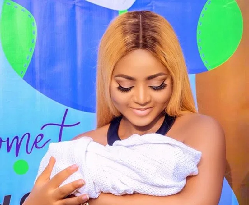 Regina Daniels shares official photos from baby's naming ceremony