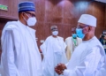 PHOTOS: Buhari Finally Wears Face Mask