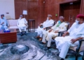 PHOTOS: Buhari Finally Wears Face Mask
