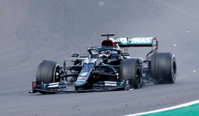 Lewis Hamilton wins British Grand Prix despite puncture on final lap