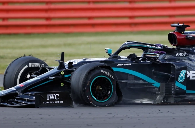 Lewis Hamilton wins British Grand Prix despite puncture on final lap