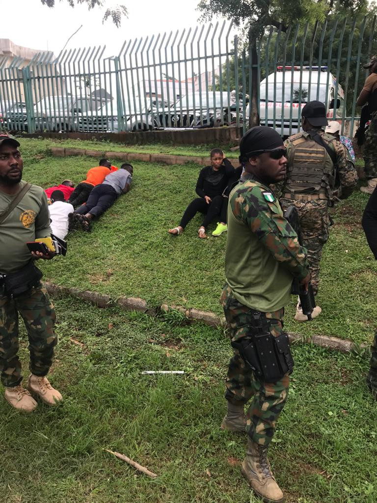 More pictures emerge as security operatives arrest #RevolutionNow protesters in Abuja