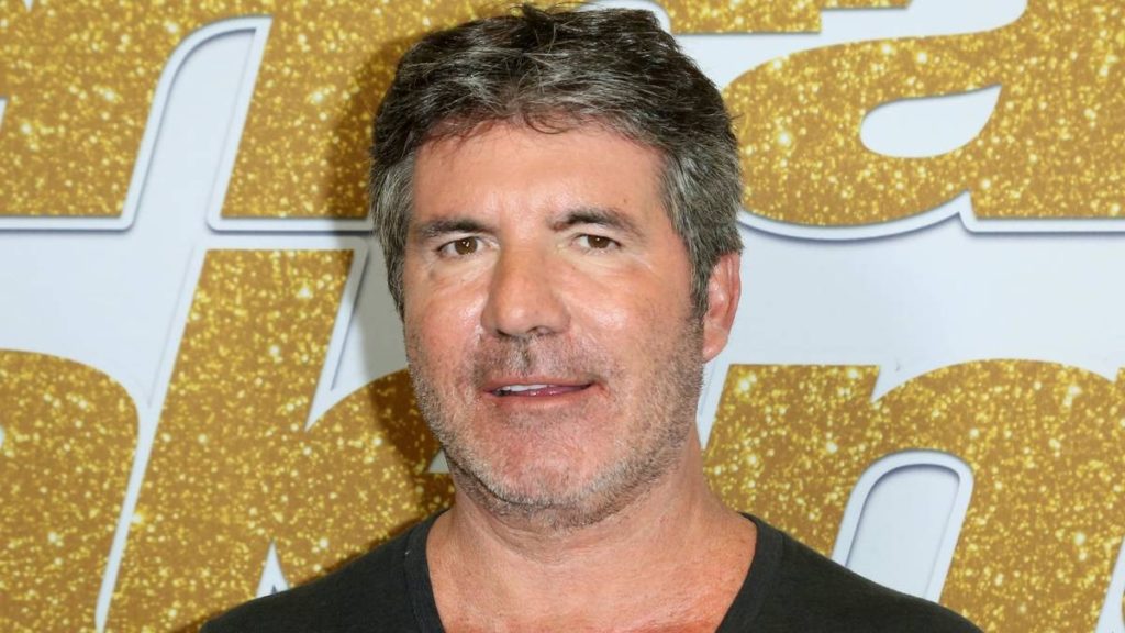 Simon Cowell hospitalised for surgery on broken back after falling off his electric bike in Malibu