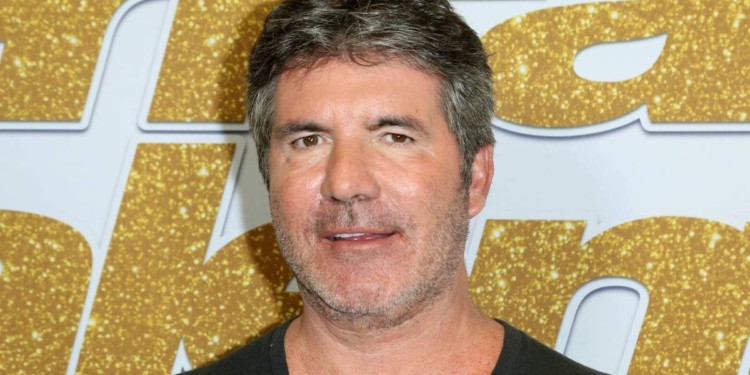 Simon Cowell hospitalised for surgery on broken back after falling off his electric bike in Malibu
