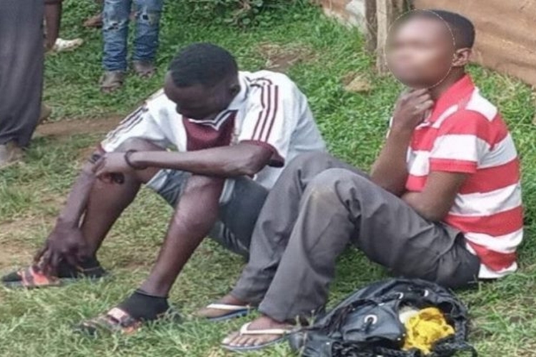 Two men arrested after being caught engaging in homosexual act