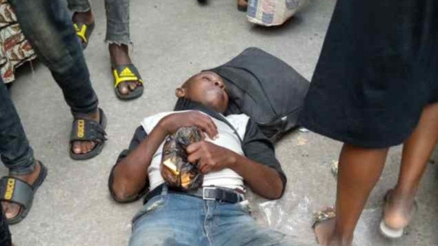 Man falls asleep near bridge in Lagos
