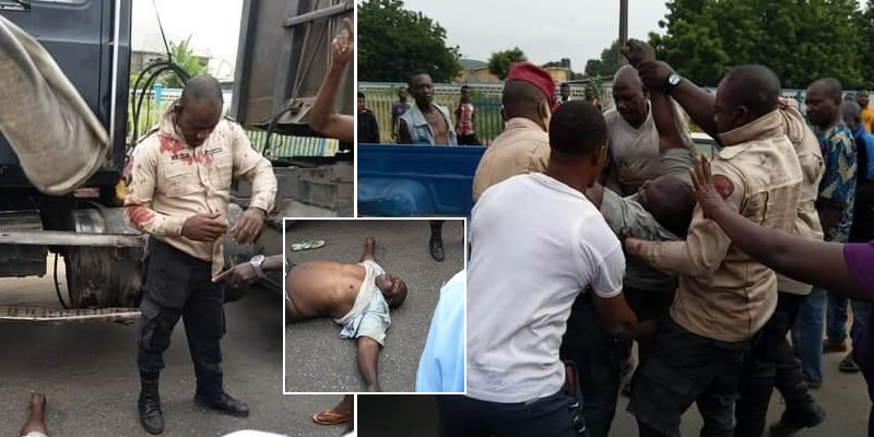PHOTOS: Angry mob pounce on FRSC official in Delta for allegedly pushing driver off his truck