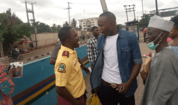 Pictures of LASTMA officials fighting passengers over N100 surface
