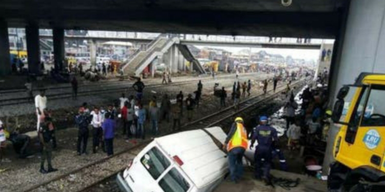 Passengers narrowly escape death as bus collides with moving train in Lagos