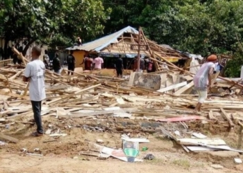 PHOTOS: FCT authorities demolish popular brothel as sex workers watch in agony