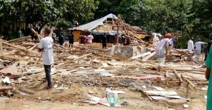 PHOTOS: FCT authorities demolish popular brothel as sex workers watch in agony