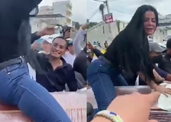 Woman twerks on top of half-opened coffin as funeral takes strange turn