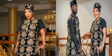 Empress and John Njamah twinning in 'Isi agwu' as they storm their brother's wedding