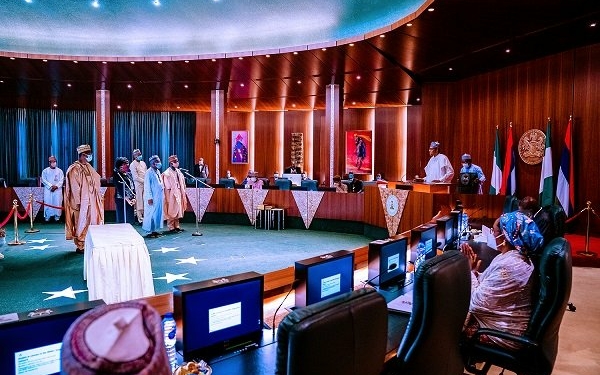 BREAKING: Buhari swears in four new Permanent Secretaries