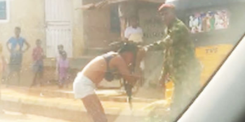 VIDEO: Soldier beats, strips lady over indecent dressing in Ogun