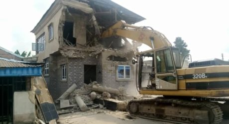 PHOTOS: Cross River Gov’t demolishes brothel, 4 houses owned by suspected kidnappers